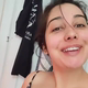 A very cute girl shits into a toilet in a close up rear view of her ass, with a turd hanging and sliding out. Vertical format video. Under a minute.